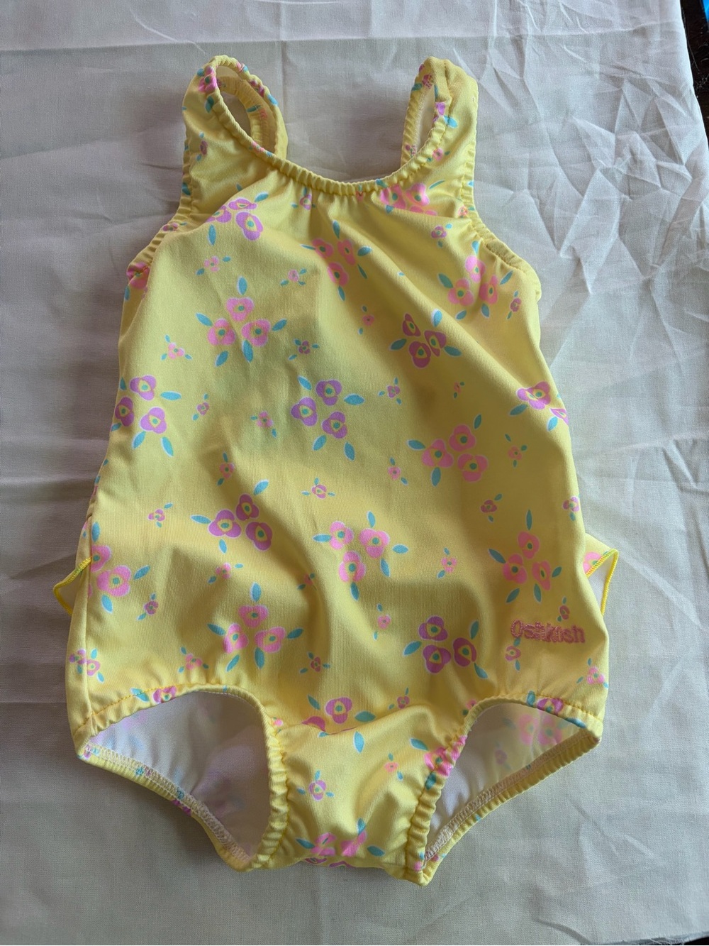 VINTAGE OshKosh B'gosh Yellow Baby Garment with Blue Logo and Pink Floral Accent